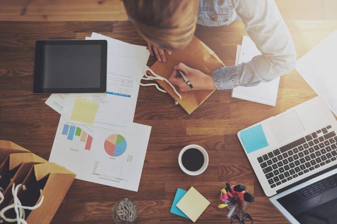 Team collaboration workspace showing design process and client consultation materials